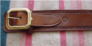 Old West Leather holsters - Cowboy Holsters and Gun Belts hand made bowie knives and knife sheaths - SHOWN HERE:  BILLETED GUN BELT