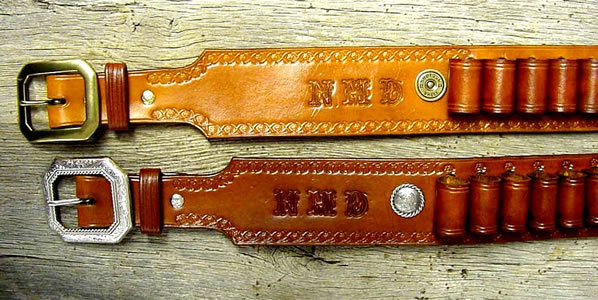 custom gunbelts, custom leather belts Old West Leather Cuffs - cowboy cuffs - holsters - gun belts in authentic Cowboy hero patterns - Spear point bowie knife with knife sheath shown