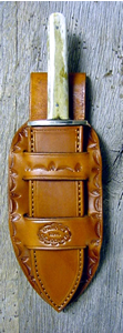 Old West Leather Cuffs - cowboy cuffs - holsters - gun belts in authentic Cowboy hero patterns - Spear point bowie knife with knife sheath shown