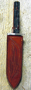 Old West Leather knife sheaths - holsters - gun belts in authentic Cowboy hero patterns - Spear point bowie knife with knife sheath shown