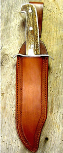 Old West Leather knife sheaths - holsters - gun belts in authentic Cowboy hero patterns - Spear point bowie knife with knife sheath shown