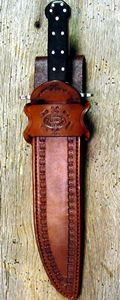 Old West Leather knife sheaths - holsters - gun belts in authentic Cowboy hero patterns - Spear point bowie knife with knife sheath shown