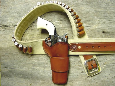 Old West Leather Cuffs - cowboy cuffs - holsters - gun belts in authentic Cowboy hero patterns - Spear point bowie knife with knife sheath shown